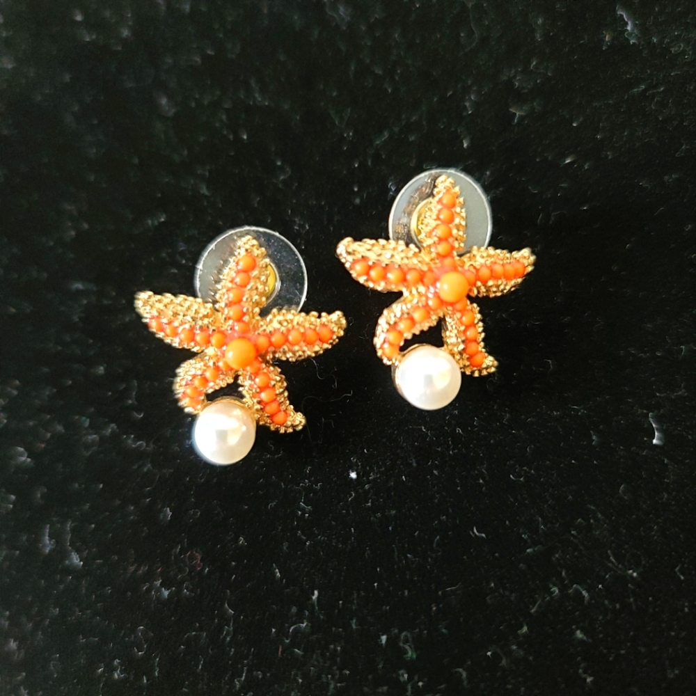 Gold starfish earrings with pearl